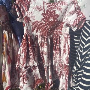 Cara Cara and a pink Chicken girls dresses